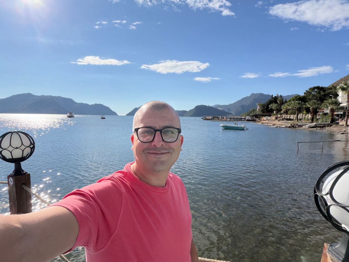 Tom, the founder of Three Smiles, on a jetty in Marmaris, Turkey